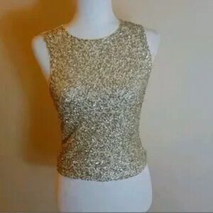 Woman’s express off white and gold sleeveless fitted sequence top size M